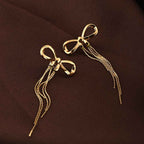 Gold Bow and Tassel Dangler Earrings