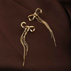 Gold Bow and Tassel Dangler Earrings